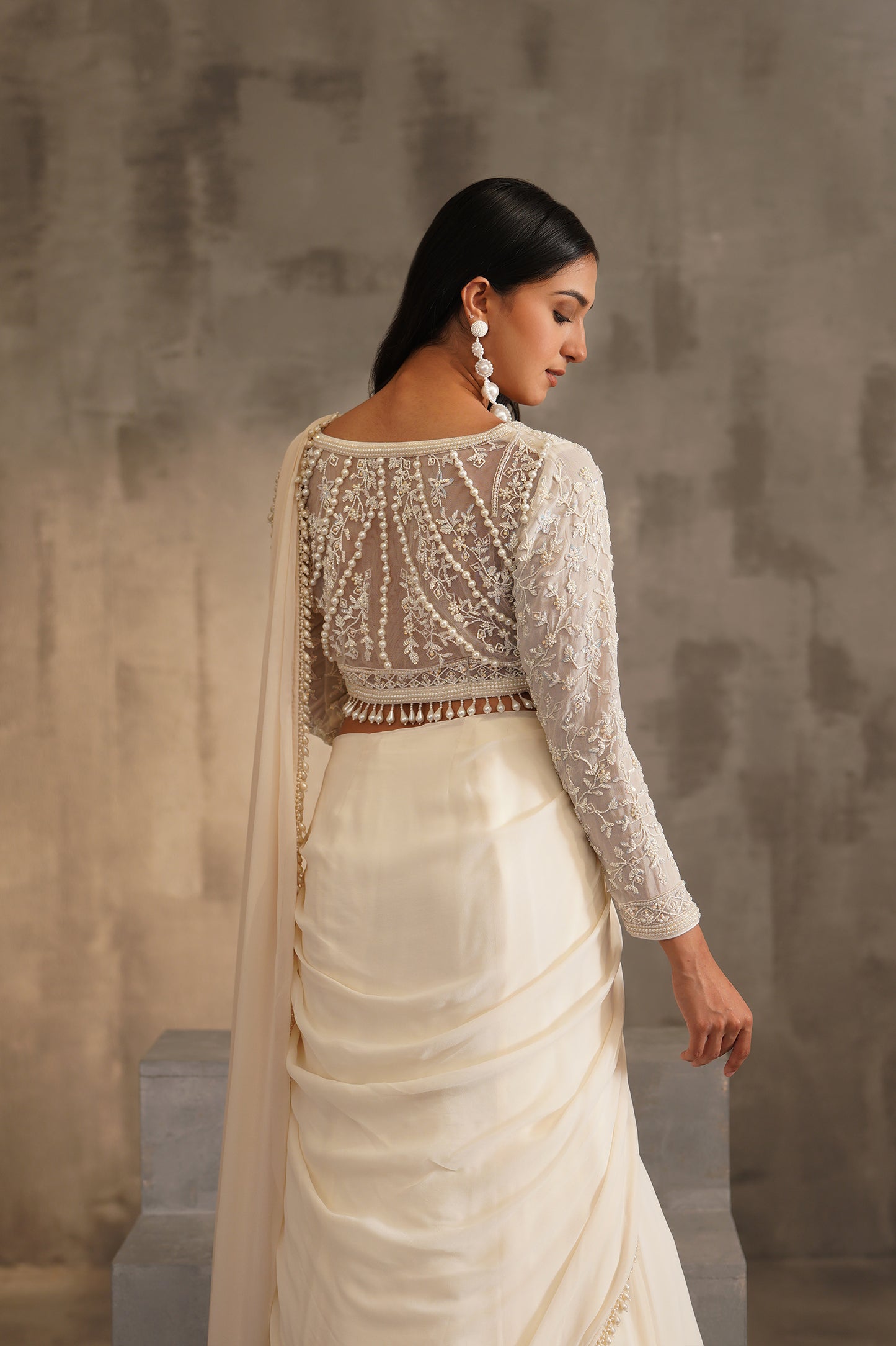 Off White Blouse and Drape Saree