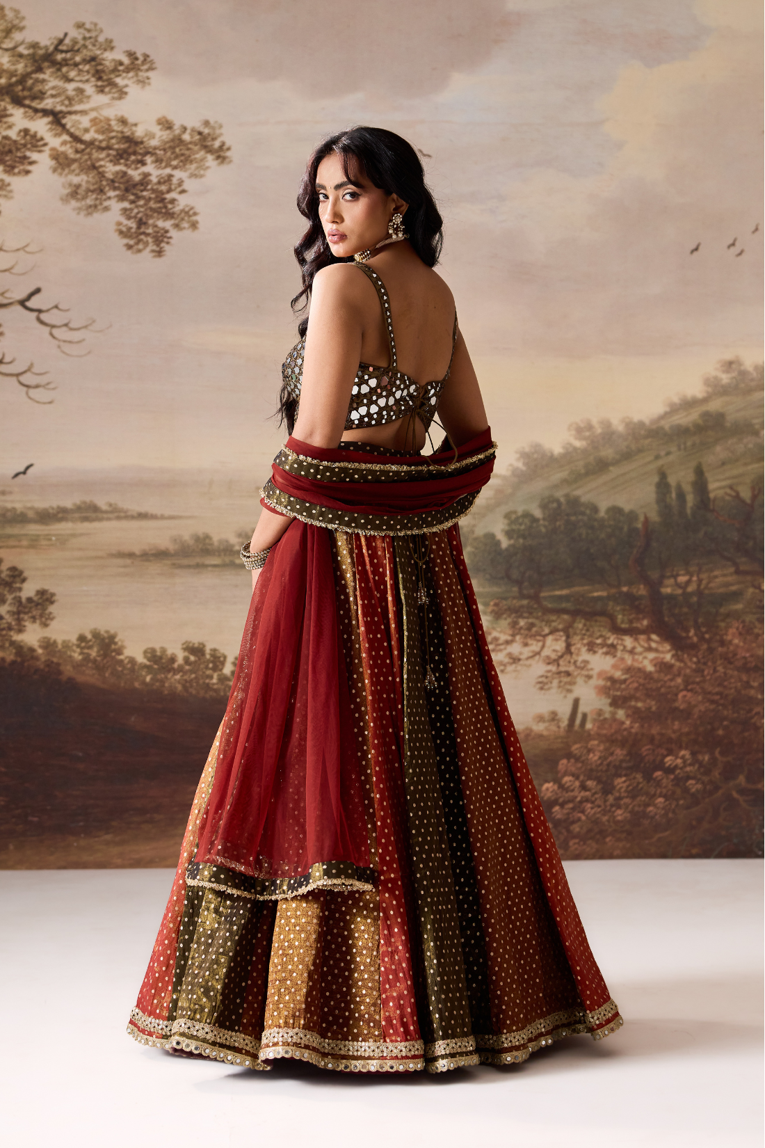 Olive green emb blouse and cosmos multipanel lehnga set