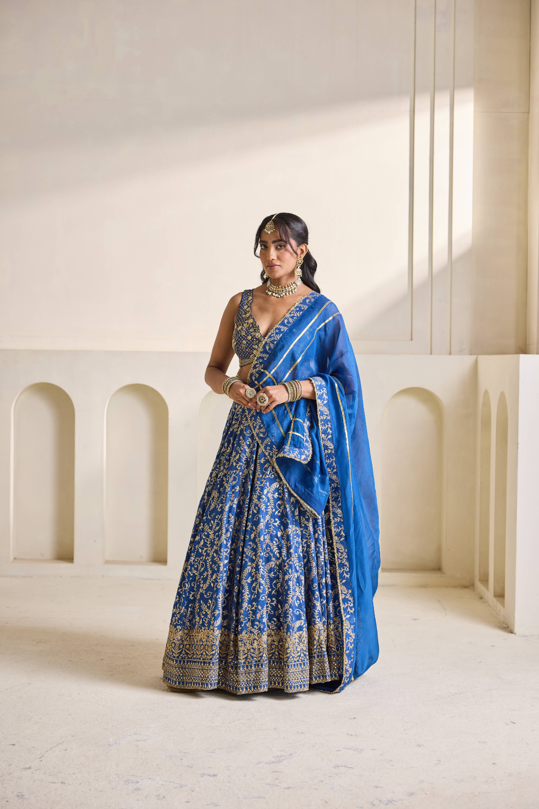 Deep blue emb blouse and Brocade lehnga set