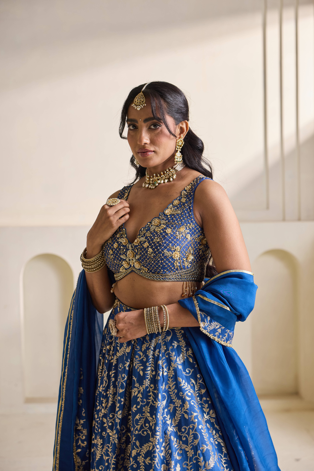 Deep blue emb blouse and Brocade lehnga set