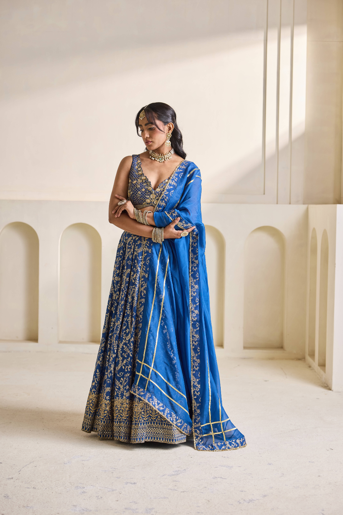 Deep blue emb blouse and Brocade lehnga set