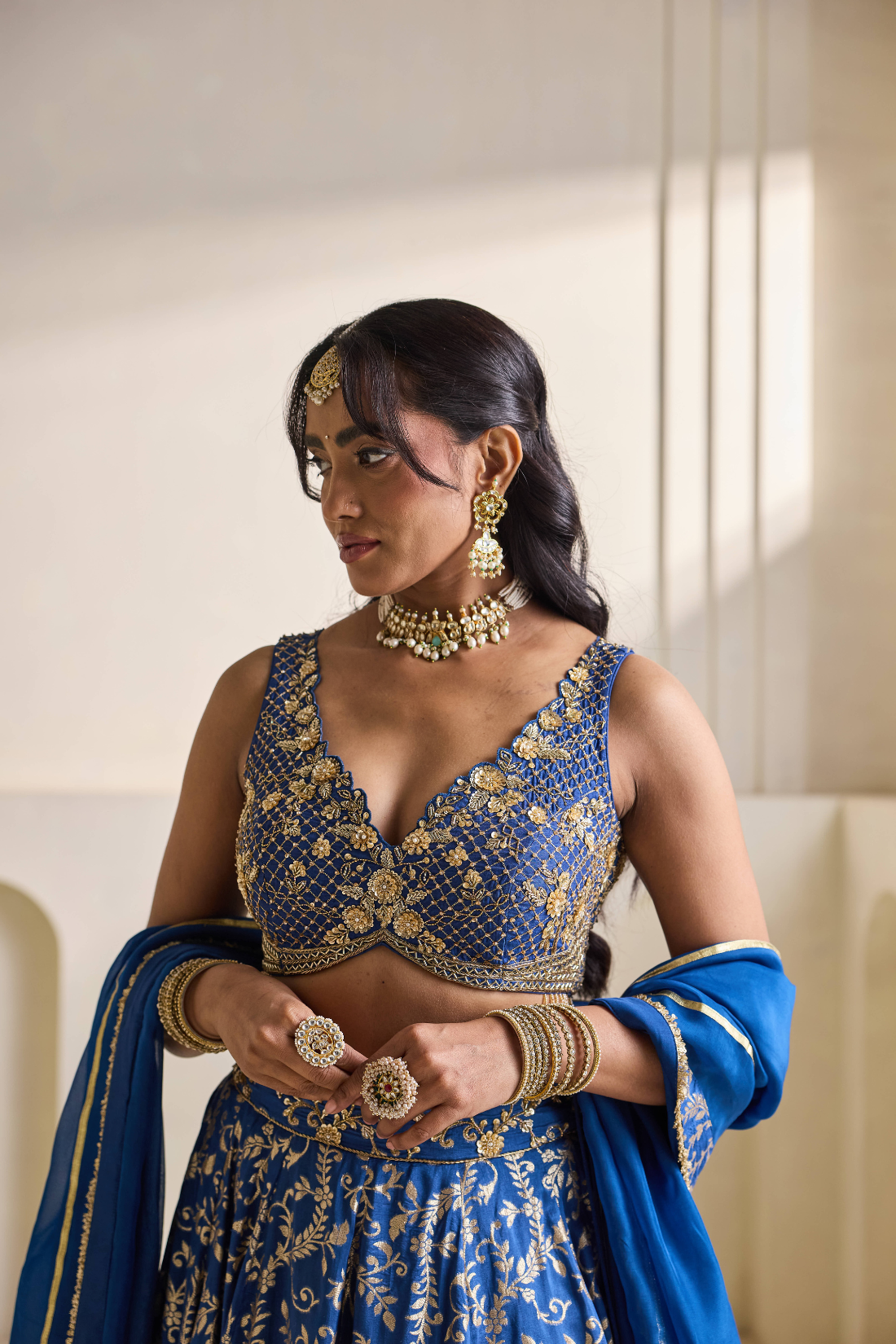 Deep blue emb blouse and Brocade lehnga set