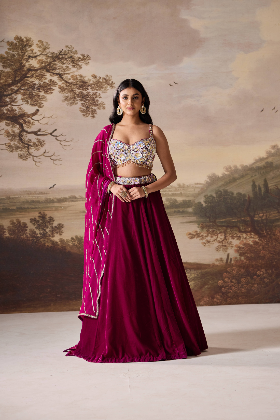 Purple emb bustier and velevt lehnga set
