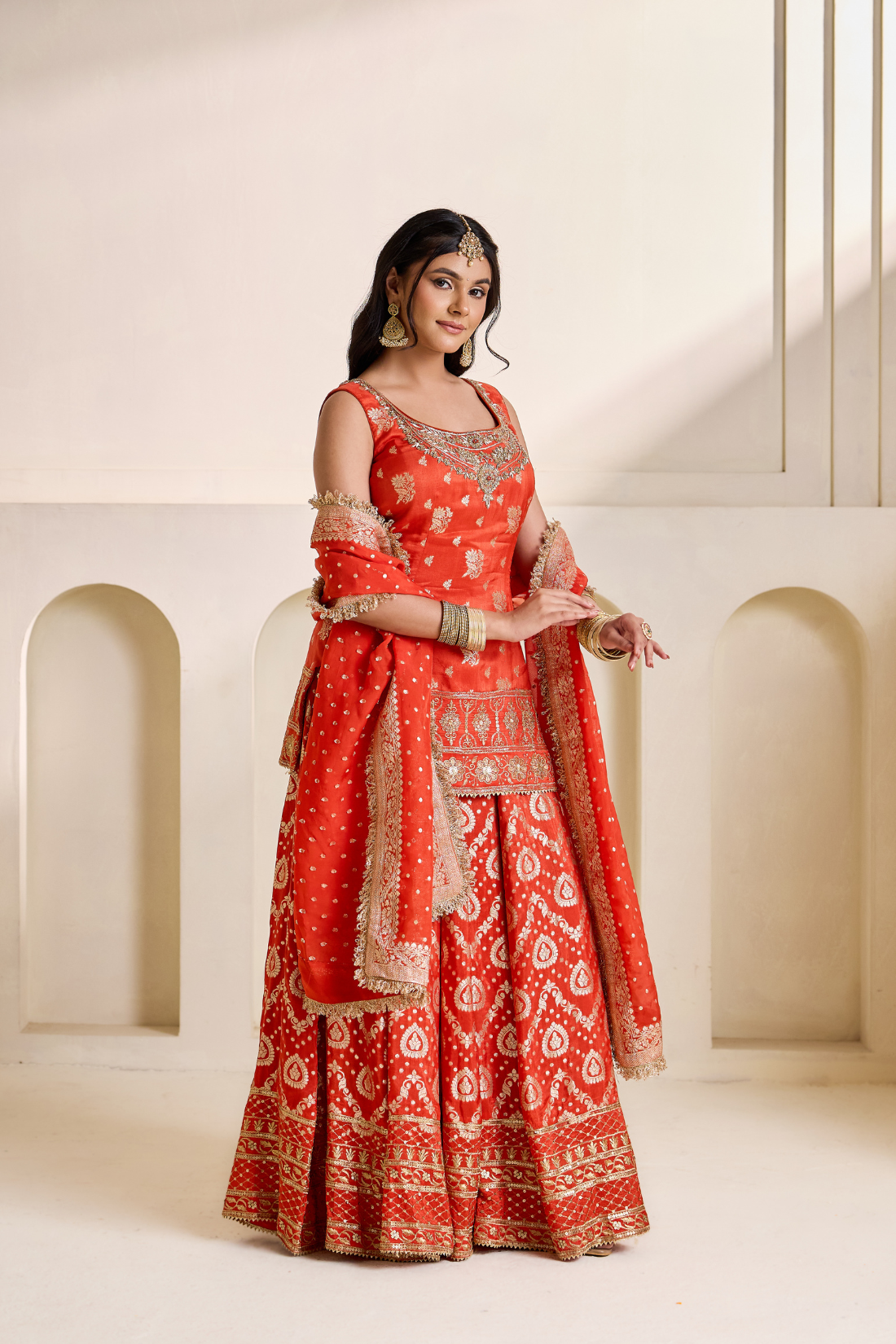 Rust orange banarsi kurti and sharara set