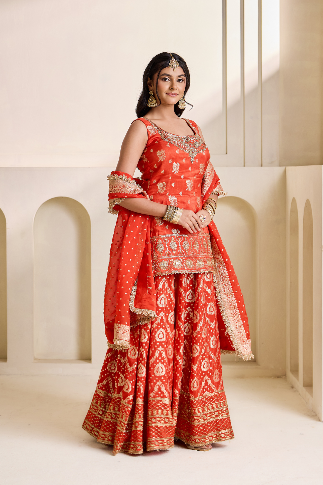 Rust orange banarsi kurti and sharara set