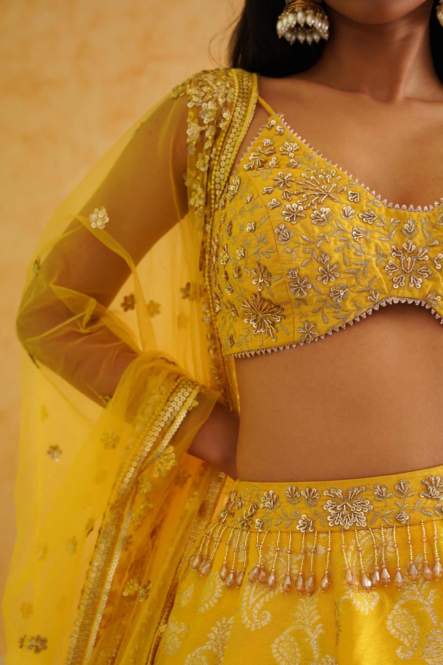 Yellow brocade lehenga, blouse and dupatta Set