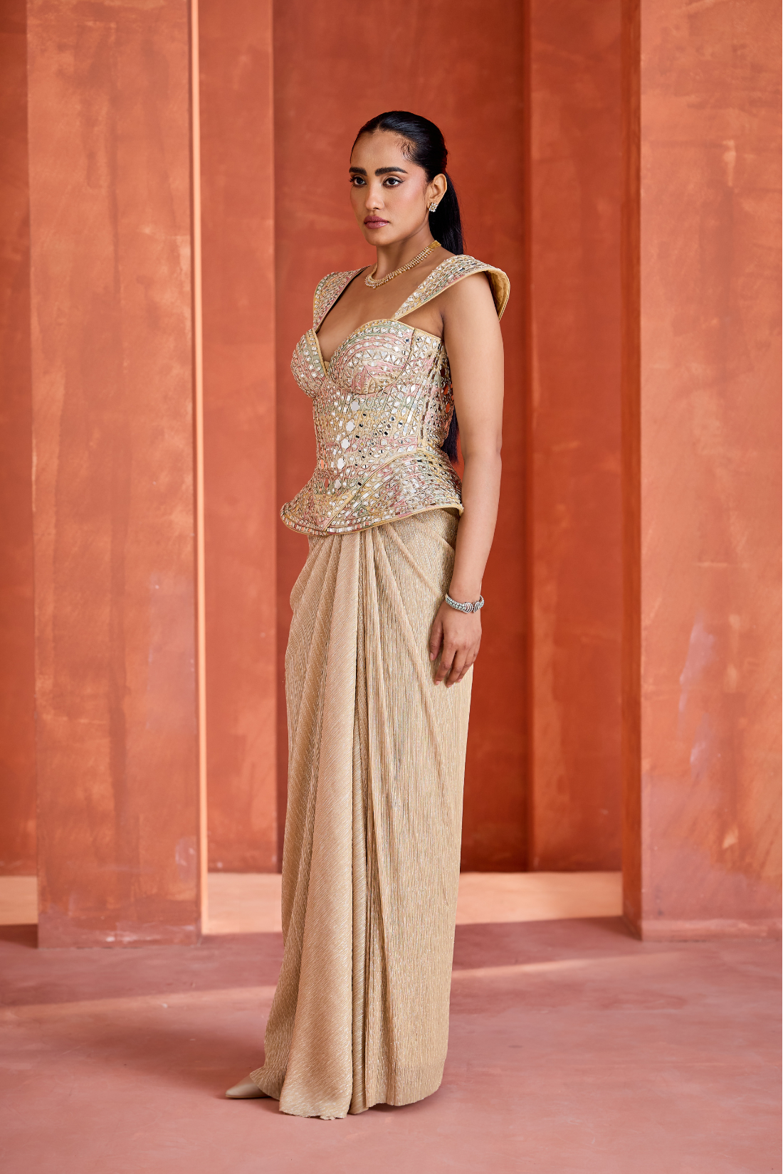 Drape skirt along pallu and Corset