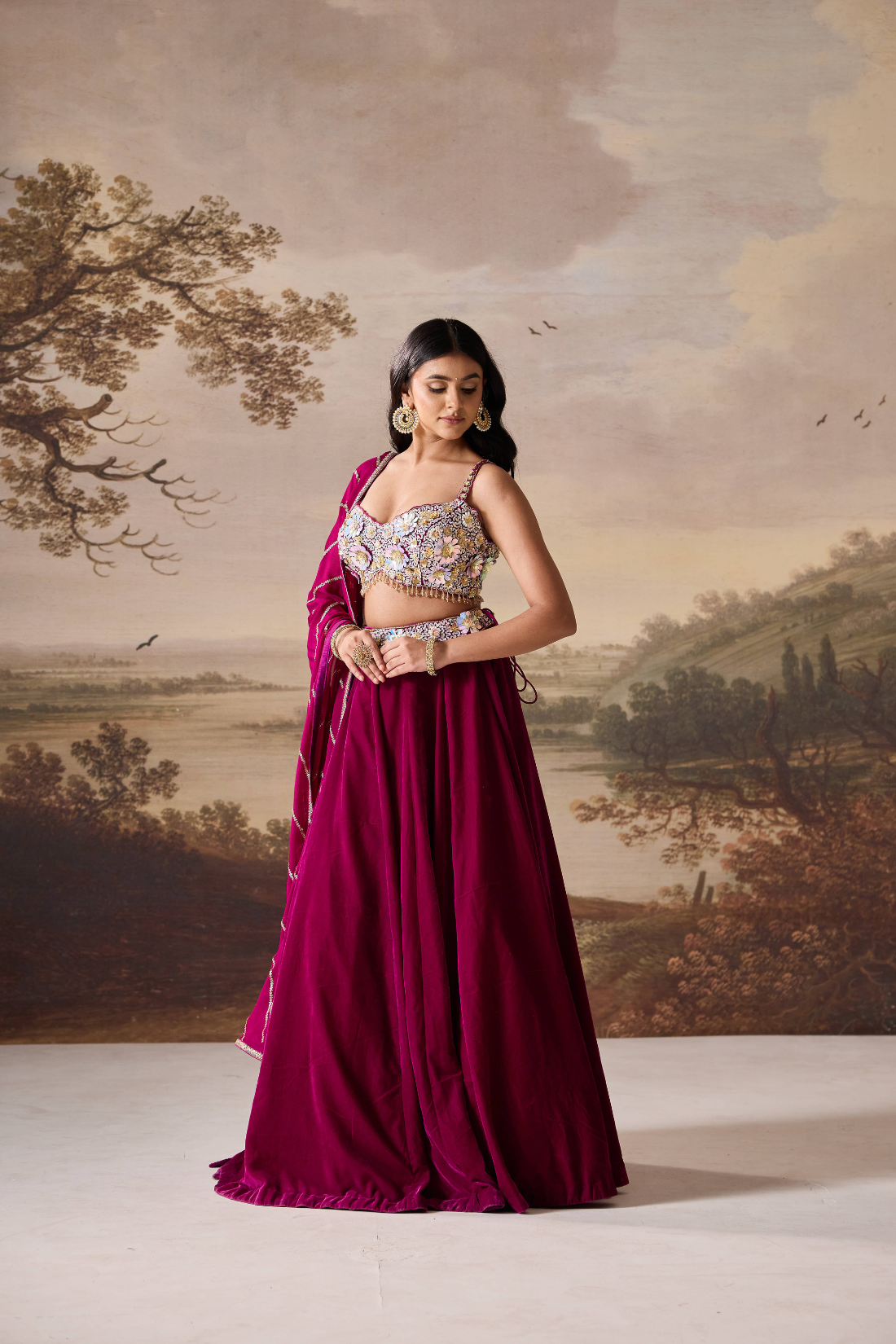 Purple emb bustier and velevt lehnga set
