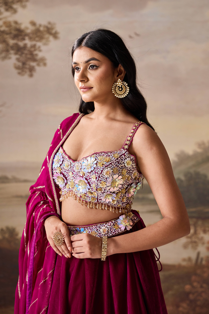 Purple emb bustier and velevt lehnga set